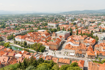 Fototapeta na wymiar Vibrant summer panorama of Ljubljana historic center from the Castle Hill, Slovenia