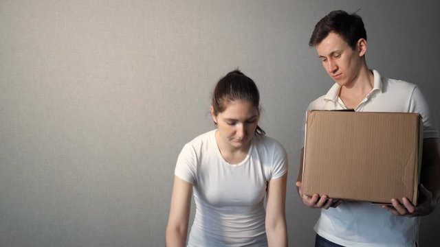 Couple Carrying Boxes Into New Home On Moving Day, 4k