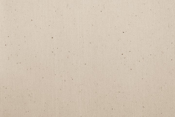 Hessian sackcloth woven texture pattern background in light beige cream brown earth color