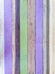 Painted wood texture pattern background in purple green brown color vintage style