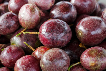 fresh ripe purple passion fruits harvest from farm