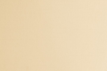 Cotton silk blended fabric texture background in yellow gold brown color