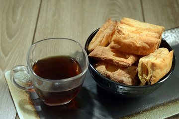 Salty crispy puff with a cup of tea, Breakfast or Tea-time