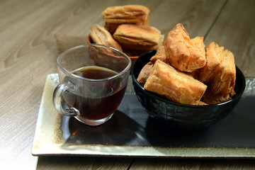 Salty crispy puff with a cup of tea, Breakfast or Tea-time