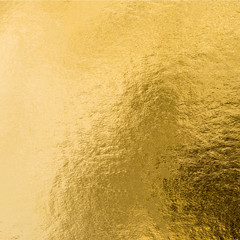 Gold foil leaf shiny wrapping paper texture background for wall paper decoration element