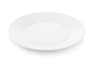 Empty white ceramic plate with embossed edges. Side view of an isolated object