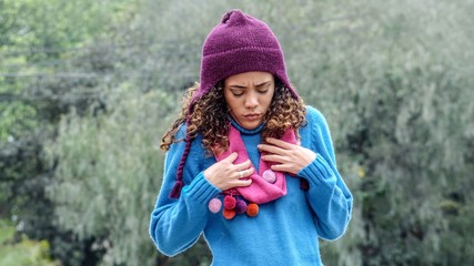 Cute Peruvian Teen Girl And Worry Wearing Winter Clothes