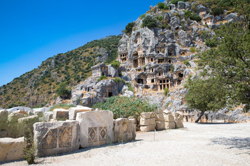 Ancient lycian necropolis with tomb carved in rocks in Mira