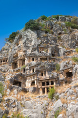 Ancient lycian necropolis with tomb carved in rocks in Mira