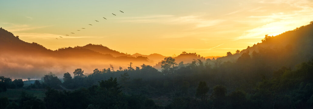 Panoramic view of forest and mountains, summer landscape with foggy hills at sunrise near coast Ngapali, Burma.