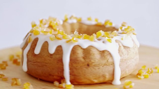 Tasty easter cake with icing and candied fruit  