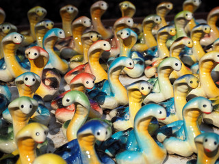 Obraz premium Traditional Snake Statues at the Spirit House inside the Temple