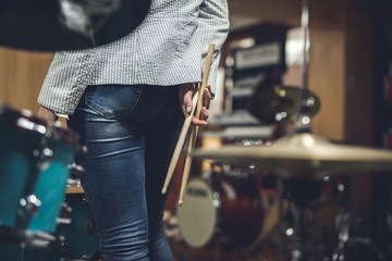 Young girl enjoys a musical instrument store
