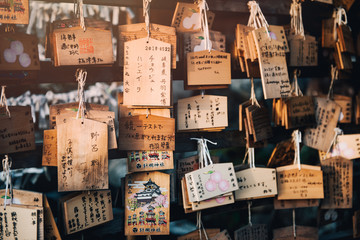 Octorbor 29, 2018 Japan, Inuyama City, Aichi Prefecture. Wooden Plate of ema by Heart shape of of Sanko Inari shrine. Pray for love.