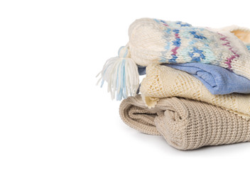 knitted sweaters on a white background