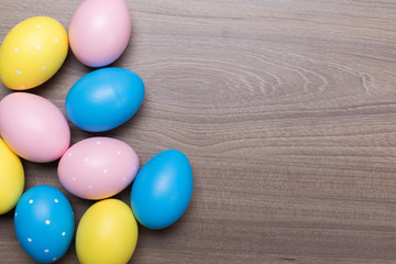 Easter eggs on wooden background