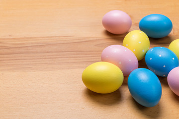 Easter eggs on wooden background