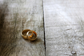 golden ring on wooden background