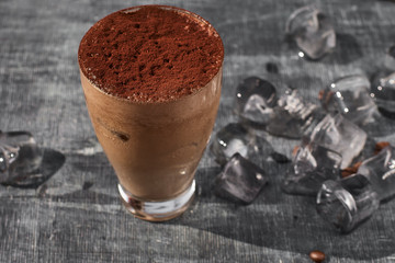 Chocolate frappe coffee outside on a summer day