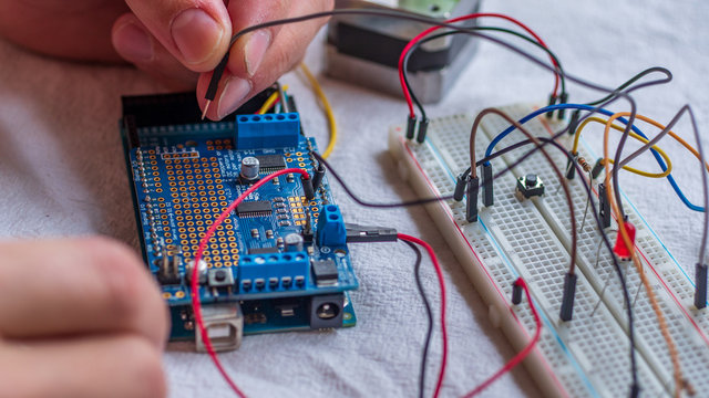 Microcontroller build closeup showing components, board and shield