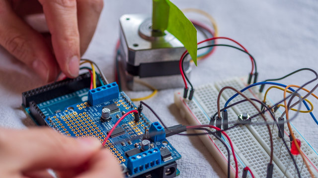 Microcontroller build closeup showing components, board and shield