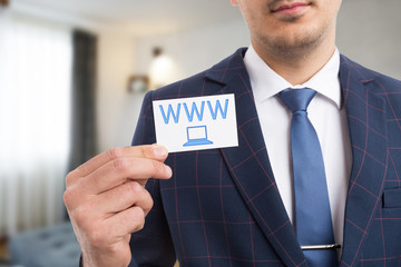 Man advertising business by presenting card with symbol.