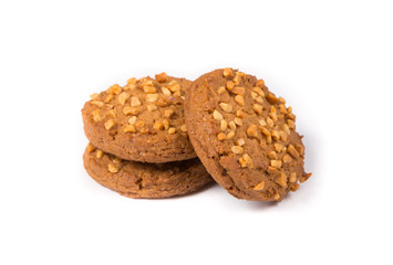 Fresh baked oatmeal cookie on a white