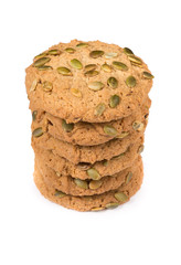 Fresh baked oatmeal cookie on a white