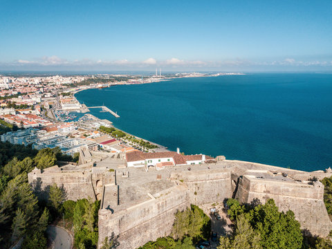 Aerial view of Setubal with fortress in the forest, Portugal