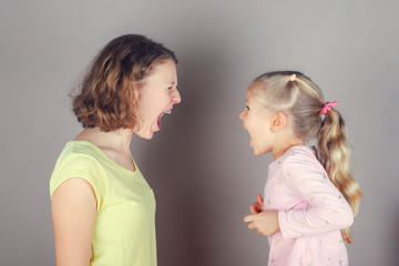 Two sisters shouting each other.