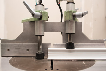 close up of aluminium piece ready to cut on machine