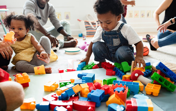 Diverse children enjoying playing with toys