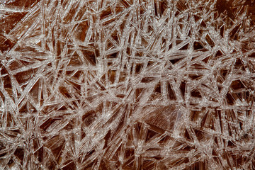 Background texture of icy straw on ground