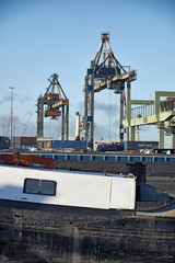 Cranes at work loading and unloading ships at the Port of Rotterdam