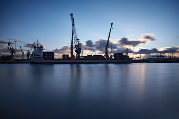 Cranes at work loading and unloading ships at the Port of Rotterdam