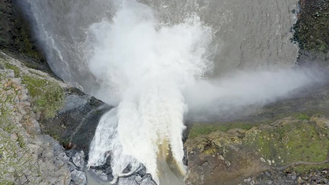 Close Up Large Waterfall Rising Above Aerial Drone Angle Looking Straight Down into Rapids