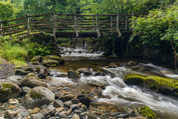 Beautiful bridge over water setting in Snowdonia National Park, Gwynedd, Wales, UK