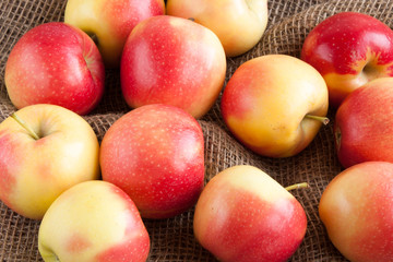 apples scattered on burlap
