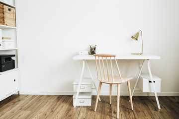 Nordic modern minimal interior design concept. Desktop table and wooden chair in white room.