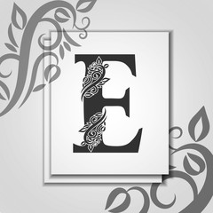 Premium letter E with Elegant floral contour for initials logo. Letter E isolated on modern card. Universal symbol template for design, business or wedding card, monogram, logotype, restaurant, cover