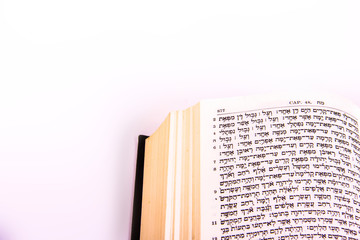 Opened hebrew Bible, isolated on white background