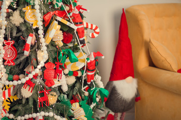New Year 2018 background with figures, Christmas toys, with frame of blue fir branches. New Year 2018 composition. Flat lay, top view of New Year 2018 festive still life