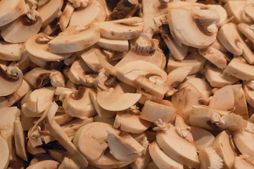 white mushrooms sliced and ready to cook