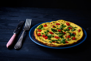 Homemade omelette on plate. Healthy food concept.
