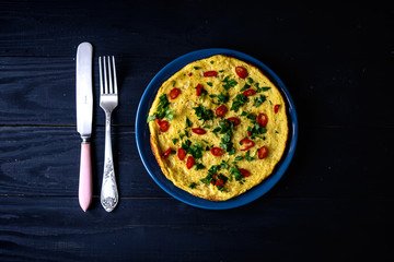 Homemade omelette on plate. Healthy food concept.