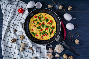 Homemade omelette on pan. Healthy food concept.