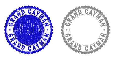 Grunge GRAND CAYMAN stamp seals isolated on a white background. Rosette seals with grunge texture in blue and grey colors. Vector rubber stamp imprint of GRAND CAYMAN title inside round rosette.