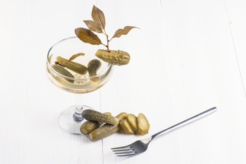 Cocktail of brine and pickle for a hangover on a white background