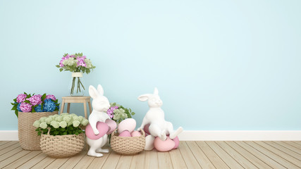 Rabbit puppets hold eggs and sit on eggs in a light blue room decorated with colorful flowers. 3D illustration for Easter day artwork.