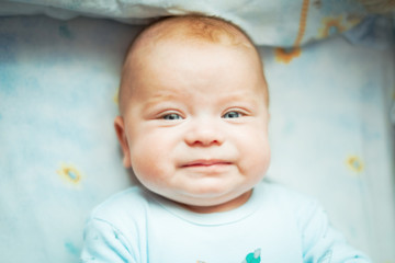 cute baby with blue eyes, small depth of field